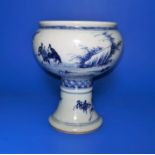 A Chinese porcelain blue and white goblet decorated with farming scenes, ht 14.5cm