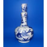 A Chinese blue and white ceramic gourd vase with elongated neck and garlic mouth, decorated with
