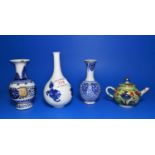 Three Chinese blue and white vases, largers 14cm and a miniature Chinese green and gilt teapot