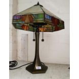 An Art Deco style lamp and shade