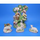 A late 18th/early 19th century Staffordshire bocage group: 2 musicians with animals, height 8.5" (