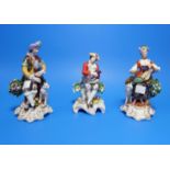 Three 19th century Dresden figures in 18th century dress: man with dog and bagpipes (foot and