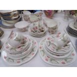 A Susie Cooper "Wild Strawberry" part tea set, 40 pieces approx