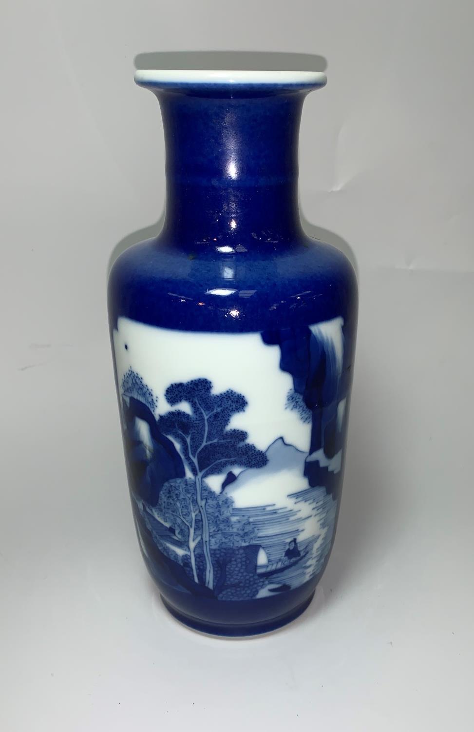 A Chinese Kangxi rouleau shaped blue and white vase, the reserve panels decorated with a landscape - Image 3 of 4