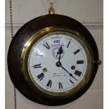 A brass ship's clock by Smith & Sons, Southampton with plaque 'SS Adriatic' (enamel chipped to lower
