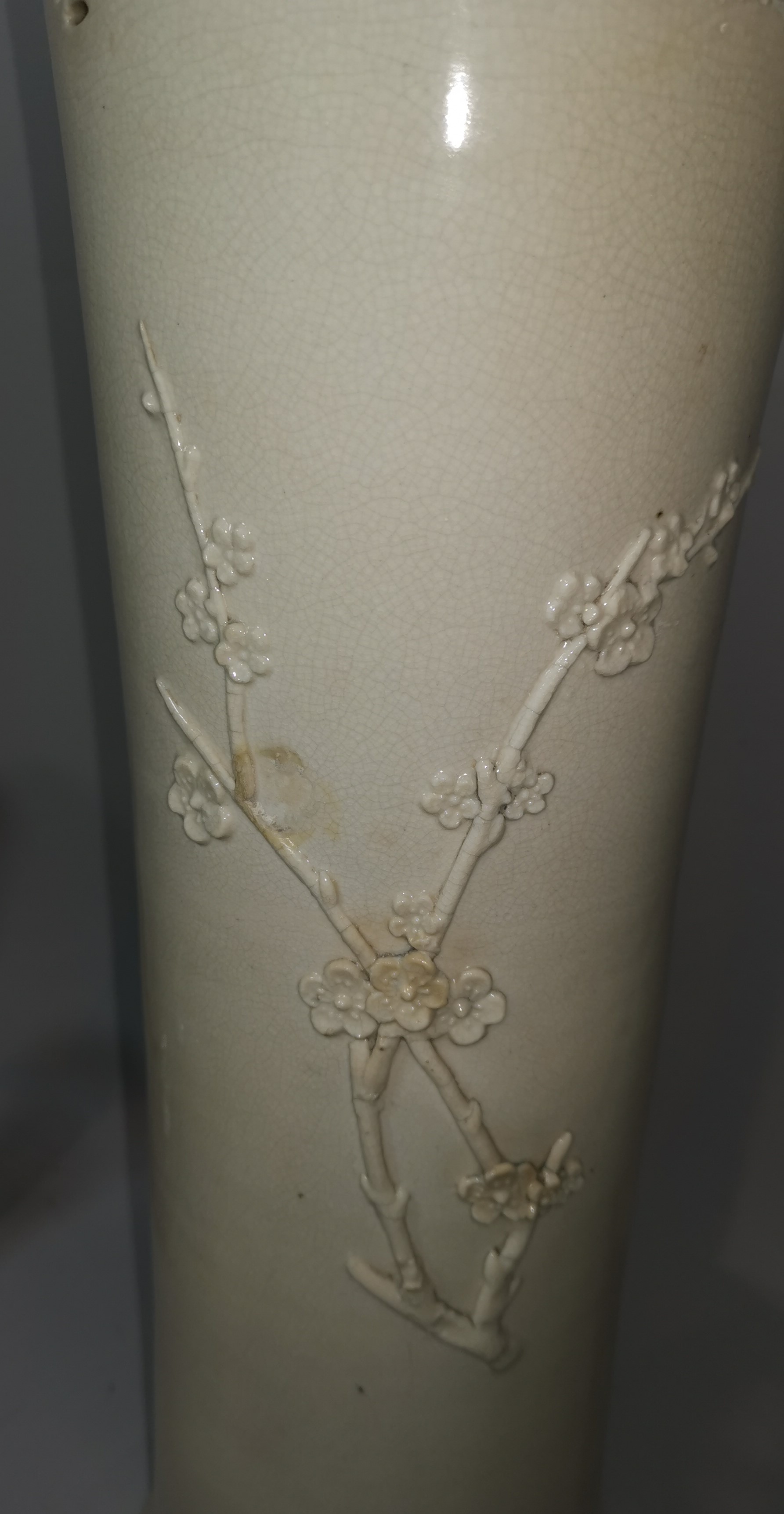 A 19th century blanc de chine cylindrical vase with flared rim, relief prunus branch decoration - Image 3 of 6