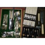 A set of silver coffee spoons, cased and a quantity of Walker and Hall EPNS cutlery, fish servers