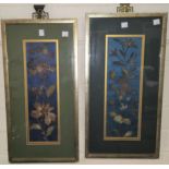 A Chinese pair of panels embroidered with gold and silvered metal thread in the form of flowering