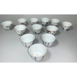 Twelve Chinese "Ching" tea bowls decorated in polychrome, 6 character signatures to base