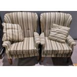 A pair of early/mid 20th century wing back armchairs by Parker Knoll, reupholstered in fawn stripe