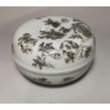 A 20th century Chinese box/covered bowl decorated with fruiting tree and branches in black an d