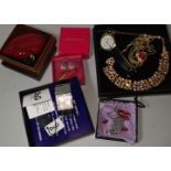 A selection of costume jewellery; a diamante 3 tier necklace, boxed; a Dolce & Gabbana chrome and