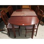 A modern mahogany dining suite comprising extending table and 4 chairs