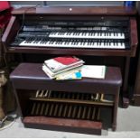 An AT 90 twin manual electric organ by Roland Atelier, with stool