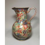 A Chinese Kangxi "clobbered" baluster jug decorated in gilt and polychrome, red seal mark to base,