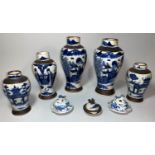 A Chinese pair of covered vases in blue & white crackle glaze, height 10.5" (lids chipped); 3