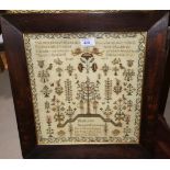 A 19th century sampler by Eliza Ann Bennett, 1844, 14" x 13", framed and glazed