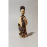 A Chinese carved ivory snuff bottle in the form of a woman with a falcon, colour stained and gilt