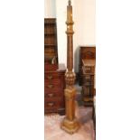 A period style carved oak standard lamp by Titchmarsh & Goodwin