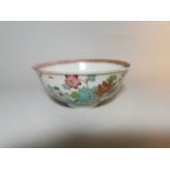 A late 19th/early 20th century Chinese porcelain bowl decorated with exotic birds and plants in