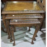 A nest of 3 Georgian style walnut occasional tables, 22"