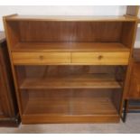 A teak cabinet / bookcase wth open shelf, 2 drawers and sliding glazed below