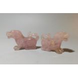 A Chinese pair of carved rose quartz dogs, 7 cm