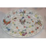 A mid 20th century Chinese porcelain oval dish decorated with polychrome butterflies, fruit, etc.,