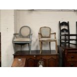 Two Louis XVI armchairs, 1 with oval back, the other with shield back