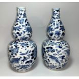 A pair of Chinese Qing double gourd blue and white vases decorated with birds, flowers etc, 4