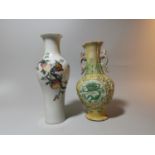 A Chinese baluster shaped vase decorated with peaches, 4 character mark (a.f.); another vase, 21 cm