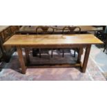 A 20th century yew-wood refectory style side table with stretcher below, on square legs, 183cm