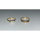 A 1920's 18 carat gold dress ring set 3 diamonds; and another, unmarked, gross weight 3.9 gm