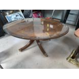 A Georgian style mahogany coffee table by Wade