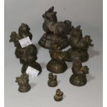 A Burmese set of 9 graduating bronze opium weights in the form of mythical birds, largest 8 cm