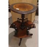 A Victorian burr walnut occasional table with circular top, galleried central tier, on turned column