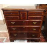 A Georgian style inlaid crossbanded stereo cabinet in the form of a chest of 8 drawers, by Bel