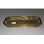 A Chinese brass brush tray, moulded decoration with pierced border, 17 cm