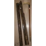 A Malacca cane with antler handle; an African hardwood stick with carved spiral shaft; 2 antique