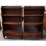 A Georgian style mahogany 3 height waterfall bookcases with crossbanded decoration, 26"