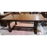 A large Royal Oak distressed oak refectory dining table with rectangular top, on turned baluster