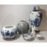 A Chinese porcelain blue & white squat vase decorated with immortals, blue seal mark to base,