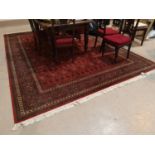 A red ground 'Royal Keshan' Persian pattern carpet and 2 similar rugs