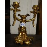 An ormolu 2 branch candelabrum with cherub support, 20cm