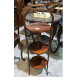 A mahogany 3 height folding cake stand