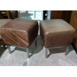 A pair of square top 'Halo' stools in brown hide
