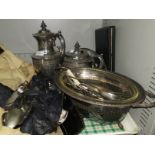 A Victorian silver plated wine jug and teapot with chased decoration; other silver plate and cutlery