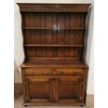 A golden oak Welsh dresser in the style of Titchmarsh & Goodwin with double cupboard and 2 drawers