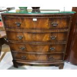 A Georgian style figured mahogany bow front chest of 4 long drawers with brass swan neck handles, on