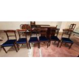 A harlequin set of 12 dining chairs in the 19th century Regency style, with wide top rails, on